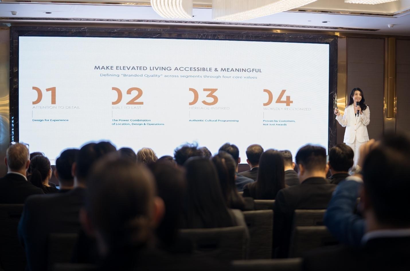 A group of people in a conference roomAI-generated content may be incorrect.