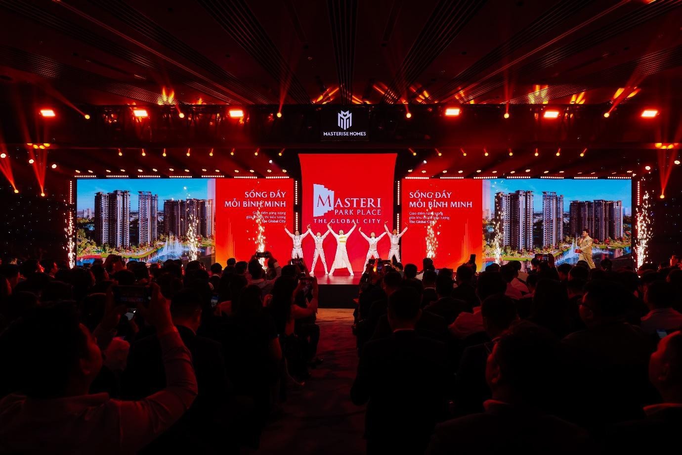 A crowd of people in a room with a large screenAI-generated content may be incorrect.