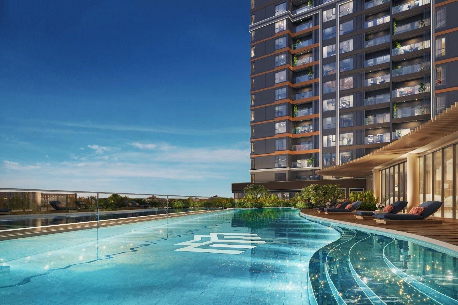 A swimming pool with a building in the backgroundAI-generated content may be incorrect.