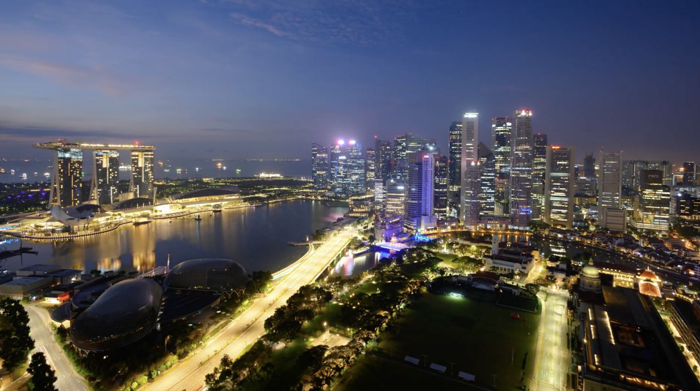 A city skyline with a body of waterAI-generated content may be incorrect.